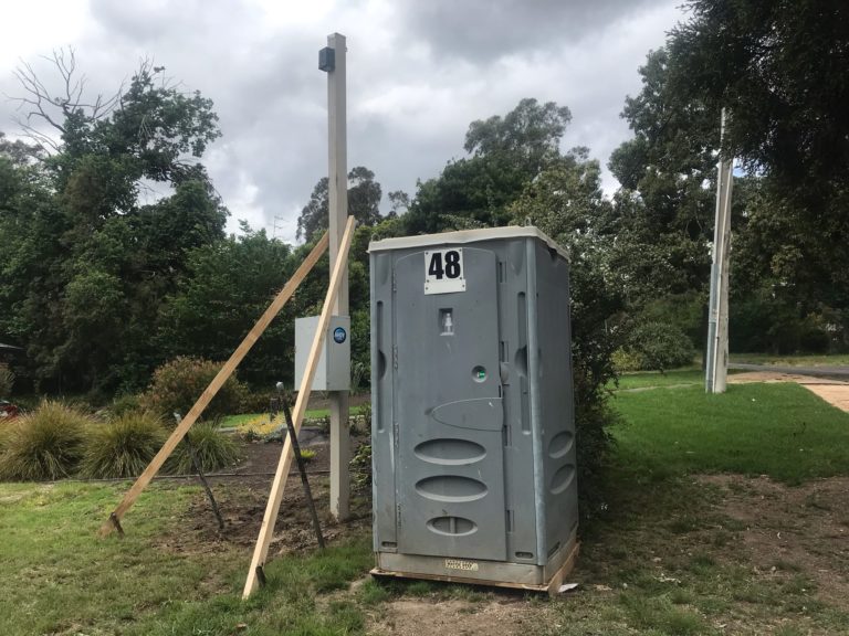 Ahoy Hire temporary power pole and portable toilet