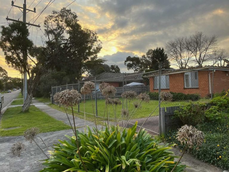 Temporary fencing around suburban property in Mount Waverley.